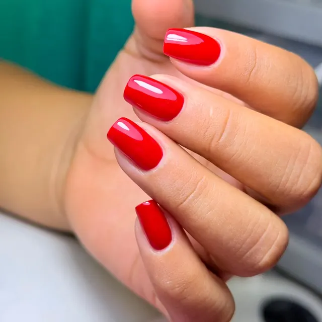 A square set finished in a deep glossy red.