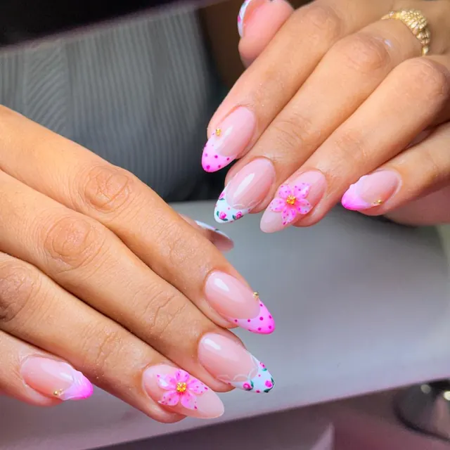 A nude set with fine floral detail and a glossy finish.